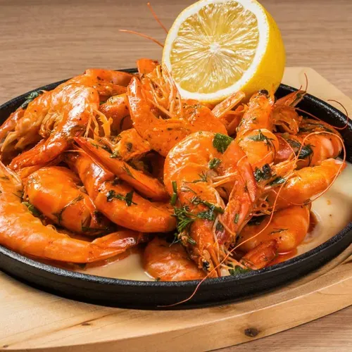 Creveți pane crocanți în sos cremos